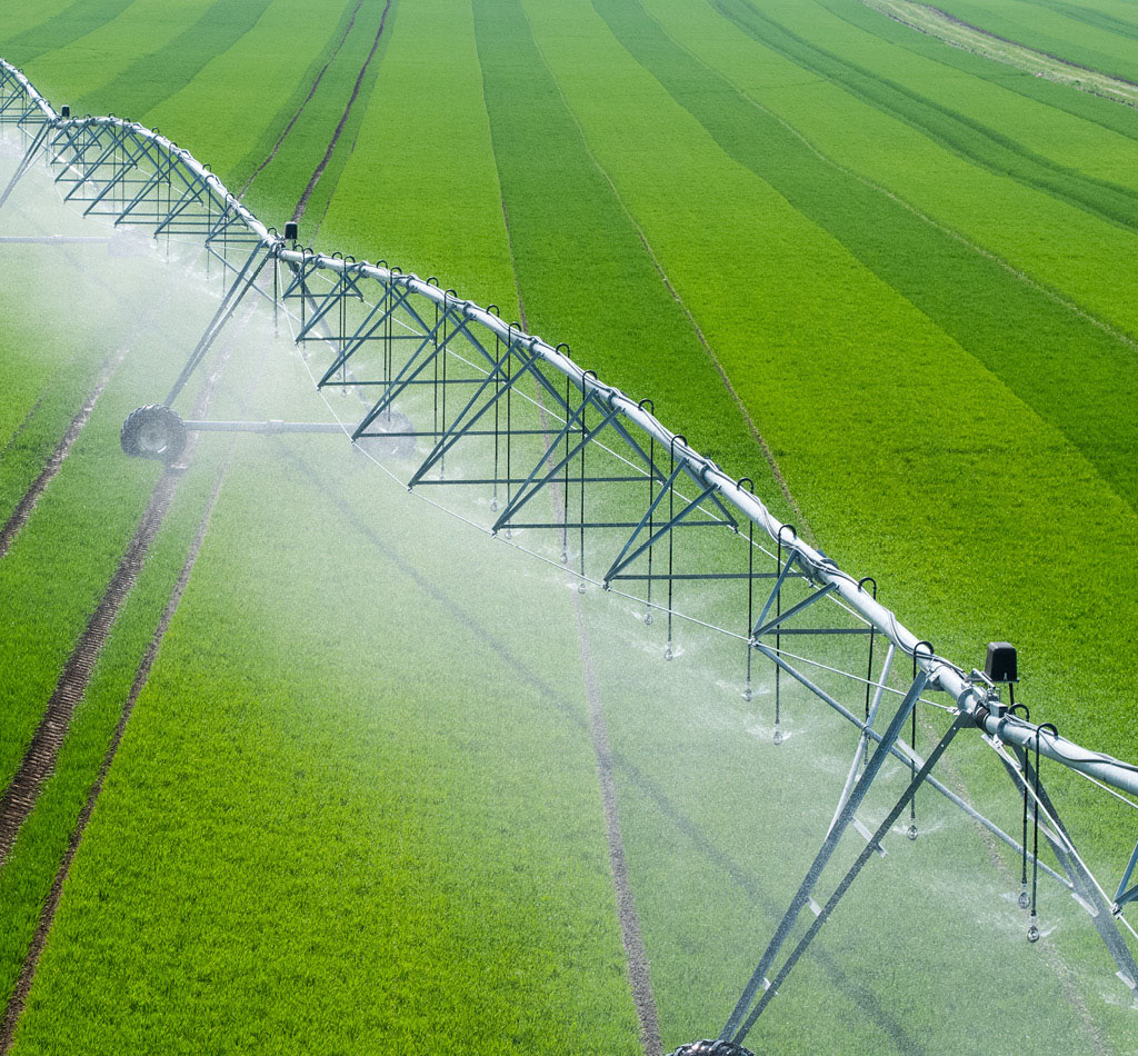 Irrigation system in a large green field.